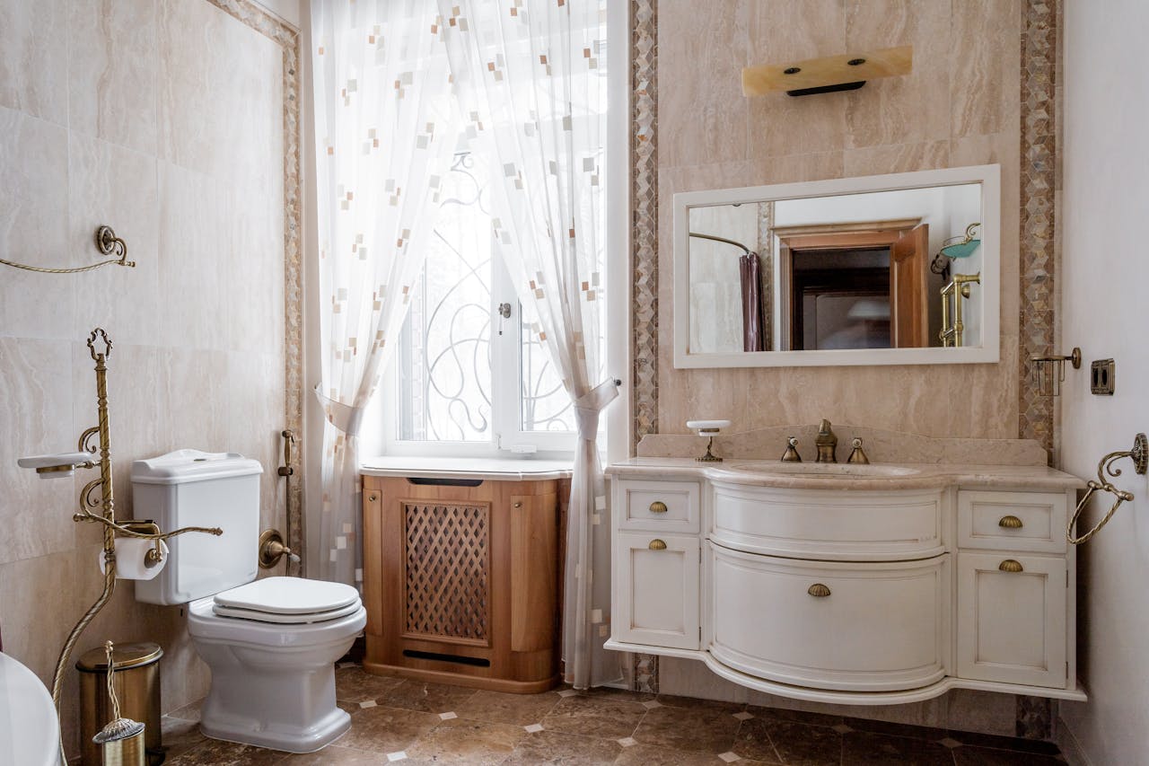 A tastefully designed vintage bathroom with classic fixtures and elegant decor.